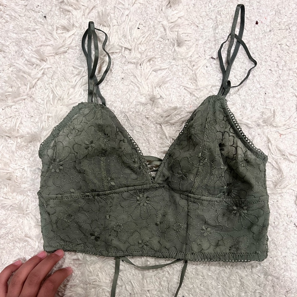 Olive green aerie mesh bralette with lace up detailing in the back